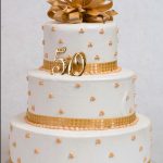 custom wedding anniversary decorated cake gold bow ribbon